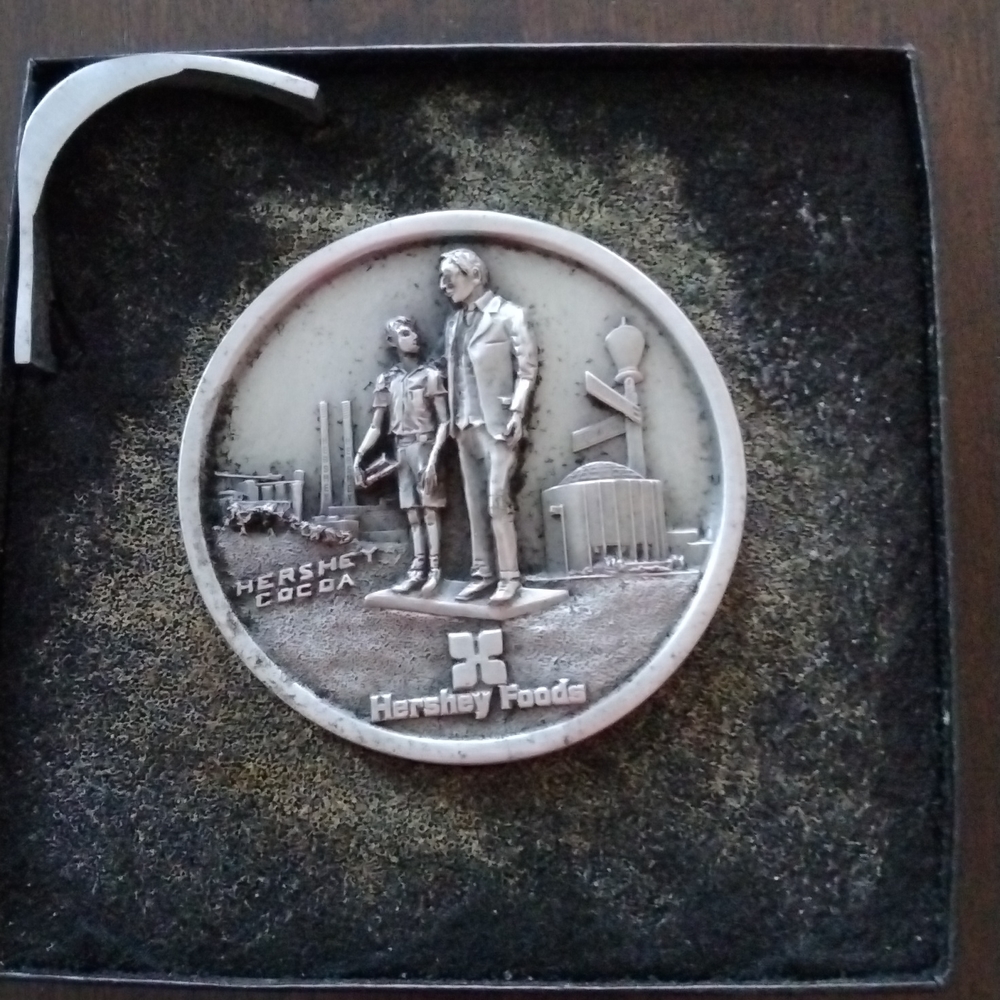 Hershey Foods employee recognition medallion with stand
